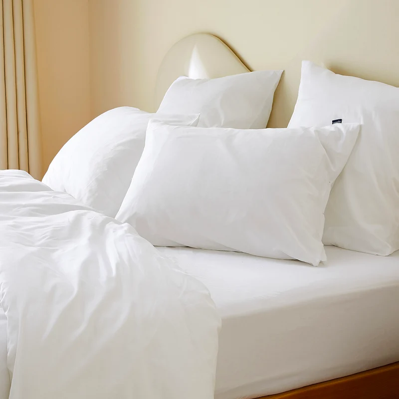 La taie d'oreiller en satin de coton bio
